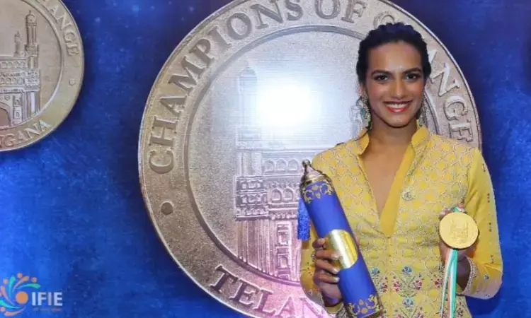 PV Sindhu with the Champions of Change Telangana Award 2021 PV Sindhu with the Champions of Change Telangana Award 2021