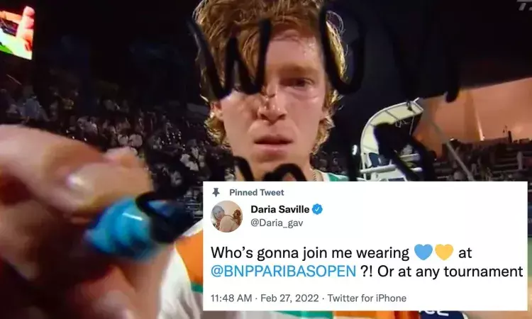 Andrey Rublev signs the camera with a No to War message while Russian-born Daria Saville will wear Ukrainian colours in solidarity