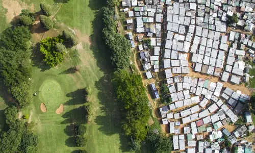 The economic divide of the sport of golf in India is evident but solutions are also on the horizon