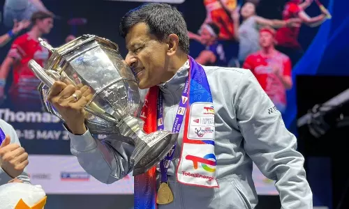 Vimal Kumar with Thomas Cup Trophy