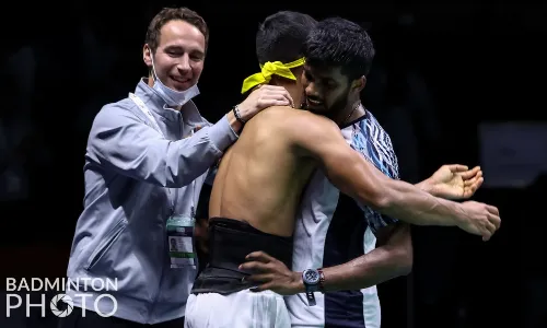 Coach Mathias Boe with pupils Satwiksairaj Rankireddy and Chirag Shetty after they won their match against Kevin Sukamuljo and Mohammad Ahsan at the Thomas Cup final