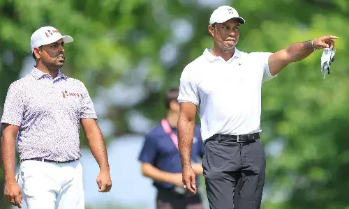 Anirban Lahiri and Tiger Woods