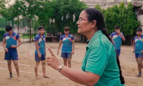 Women coach with women athletes