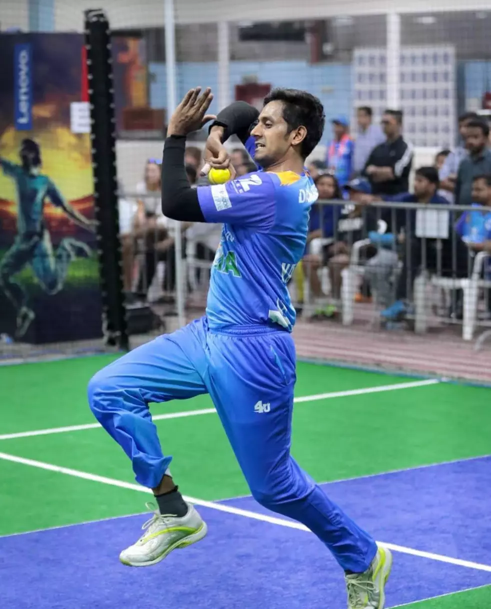 An image of Indian cricketer Yathish Gowda from the 2017 Indoor Cricket World Cup which is part of the official poster of the 2022 Indoor Cricket World Cup