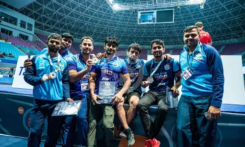Indian Greco-Roman team with their medals at Zouhaier Sghaier.