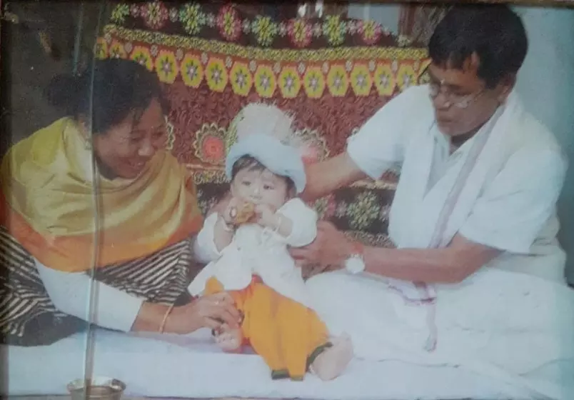 An infant Bindyarani Devi at a traditional ceremony