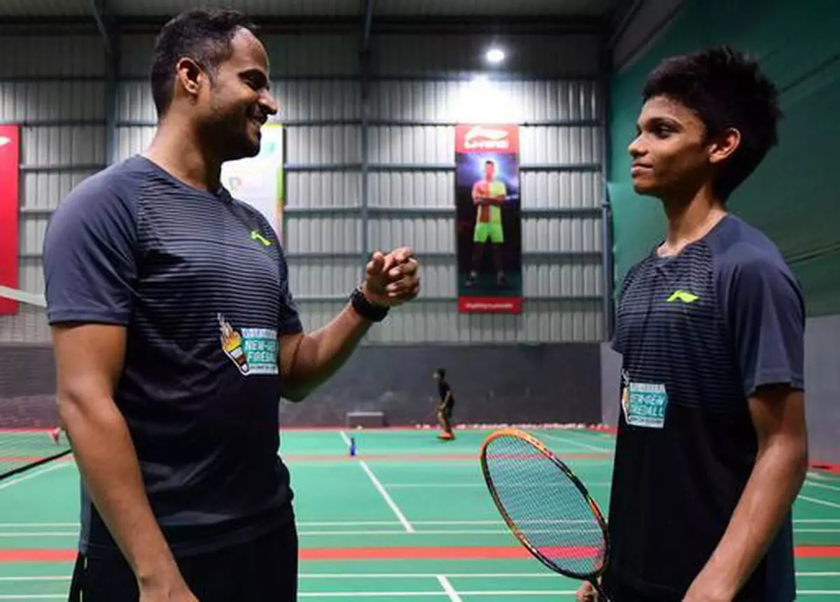Sankar Muthusamy (right) with his coach Aravindan Samiappan 