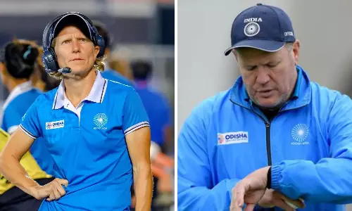 Graham Reid and Janneke Schopman win the FIH Coach of the year award