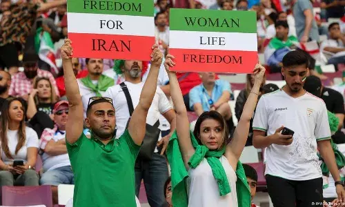 Iran government supporters confront protesters at FIFA World Cup Iran government supporters confront protesters at FIFA World Cup