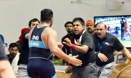 International referee sacked from WFI technical committee for supporting wrestlers protest International referee sacked from WFI technical committee for supporting wrestlers protest