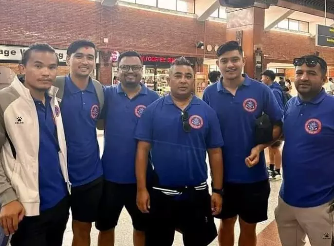 Machhindra FC players and their coach Kishore Kumar ahead of their departure to Kolkata for AFC Cup preliminary round two match. 