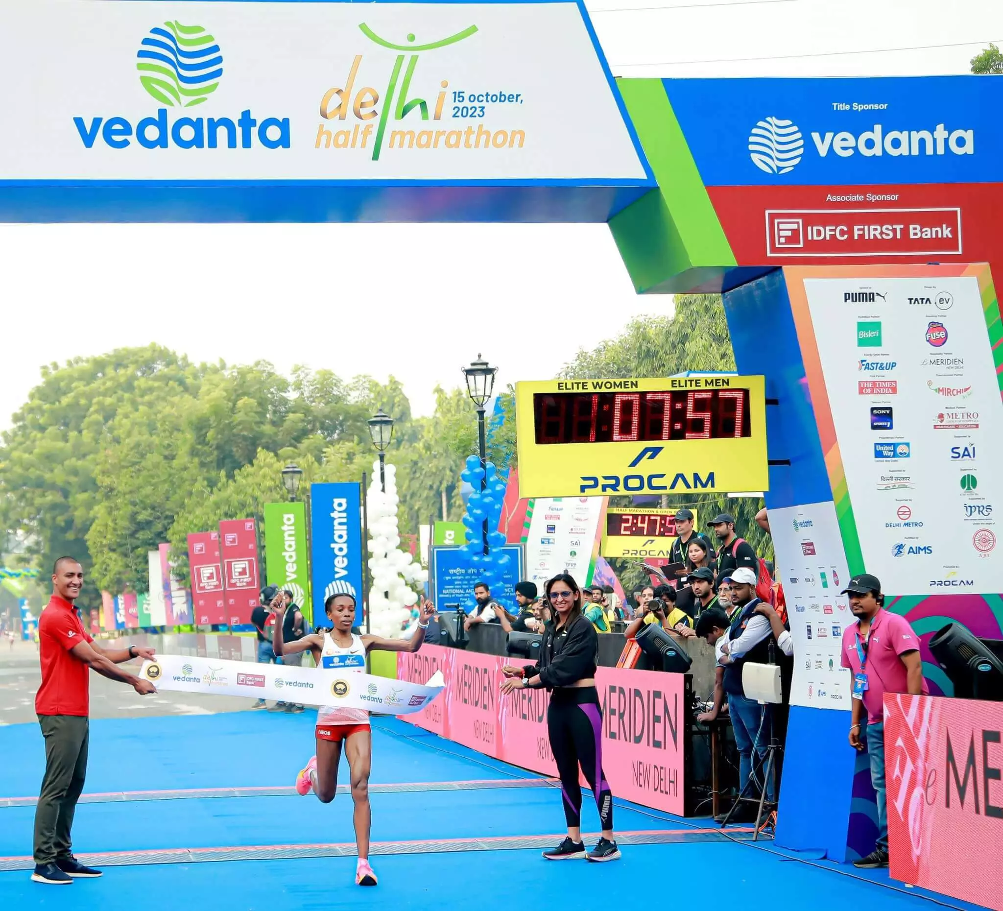 Ethiopia’s Almaz Ayana crosses the finish line to win the overall women’s title at the Vedanta Delhi Half Marathon 2023 Ethiopia’s Almaz Ayana crosses the finish line to win the overall women’s title at the Vedanta Delhi Half Marathon 2023