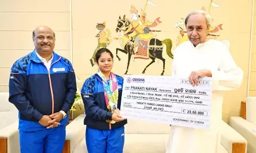 Odisha CM Naveen Patnaik felicitates gymnast Pranati Nayak with Rs 23 lakh cash prize Odisha CM Naveen Patnaik felicitates gymnast Pranati Nayak with Rs 23 lakh cash prize