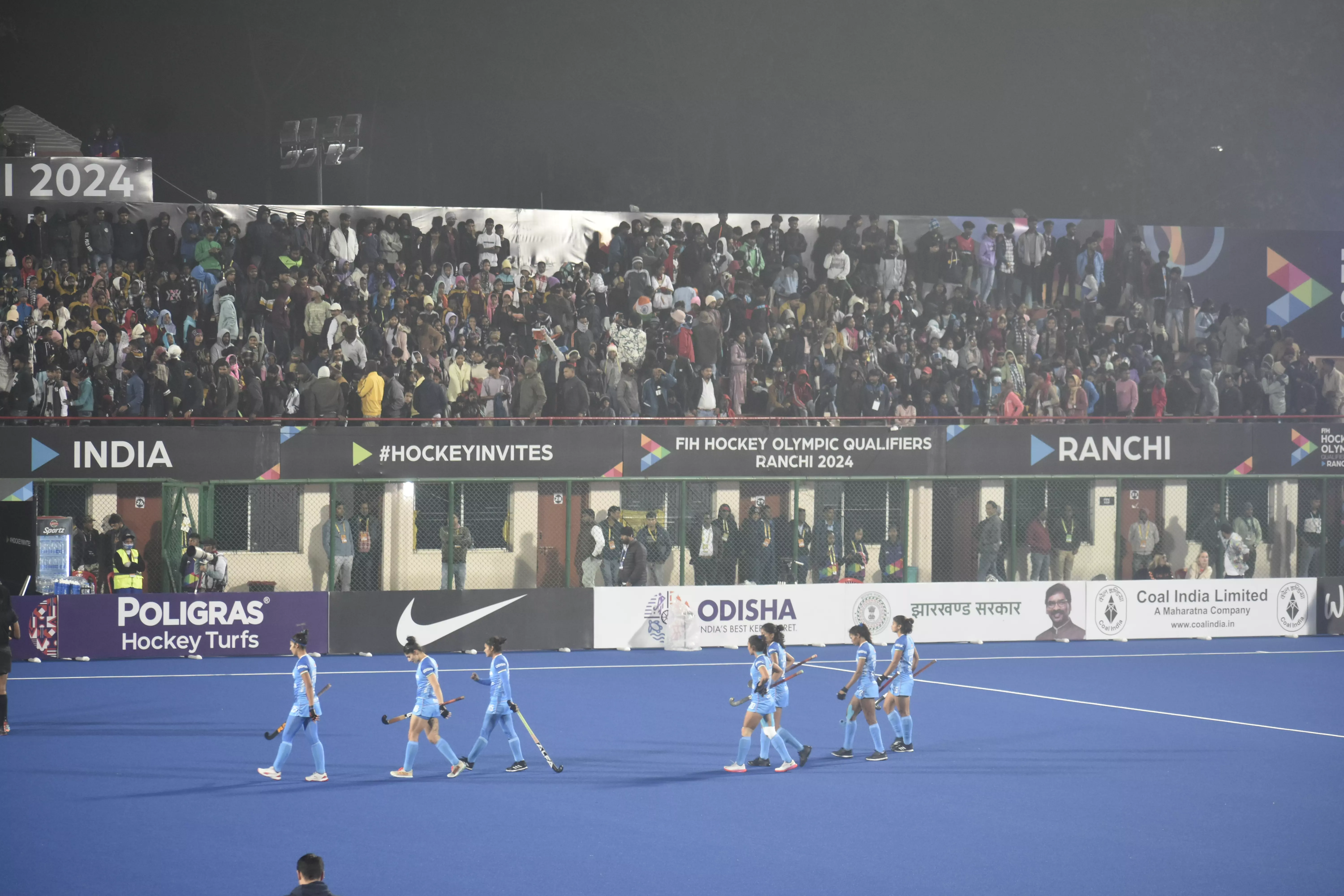 Indian womens team trudge off slowly after losing to Japan in the third-place match of the Womens Hockey Olympic qualifiers. (PritishRaj/TheBridge)