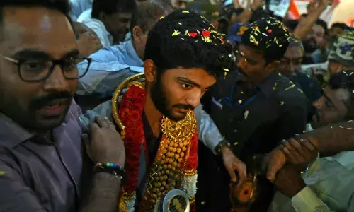 Gukesh D receives hero’s reception in Chennai