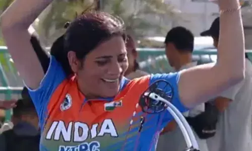 Sarita celebrates her gold medal win at Asia Para Archery Cup
