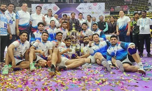 Services pose with the trophy after winning the 71st Senior Kabaddi Nationals