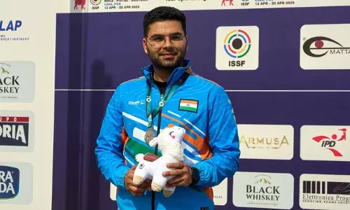 Arjun Babuta with his silver medal at 2025 ISSF World Cup in Lima, Peru