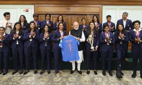 Indian womens cricket team presents signed jersey to PM Modi