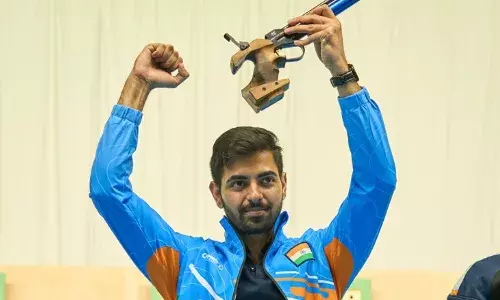 Samrat Rana celebrates after being crowned the mens 10m air pistol world champion