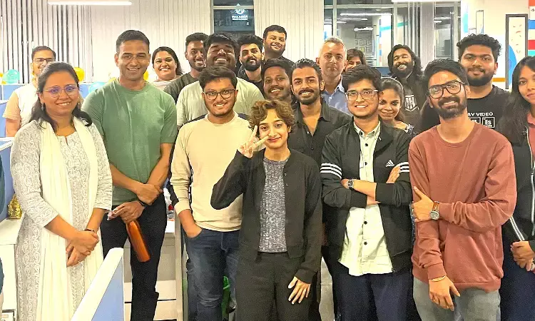 Nithin Kamath with The Bridge team in August 2024.