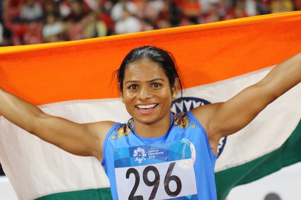Dutee Chand with the Indian national flag