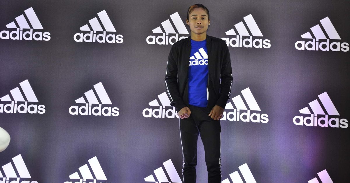 Once I scribbled Adidas on my they now make with my name: Hima Das