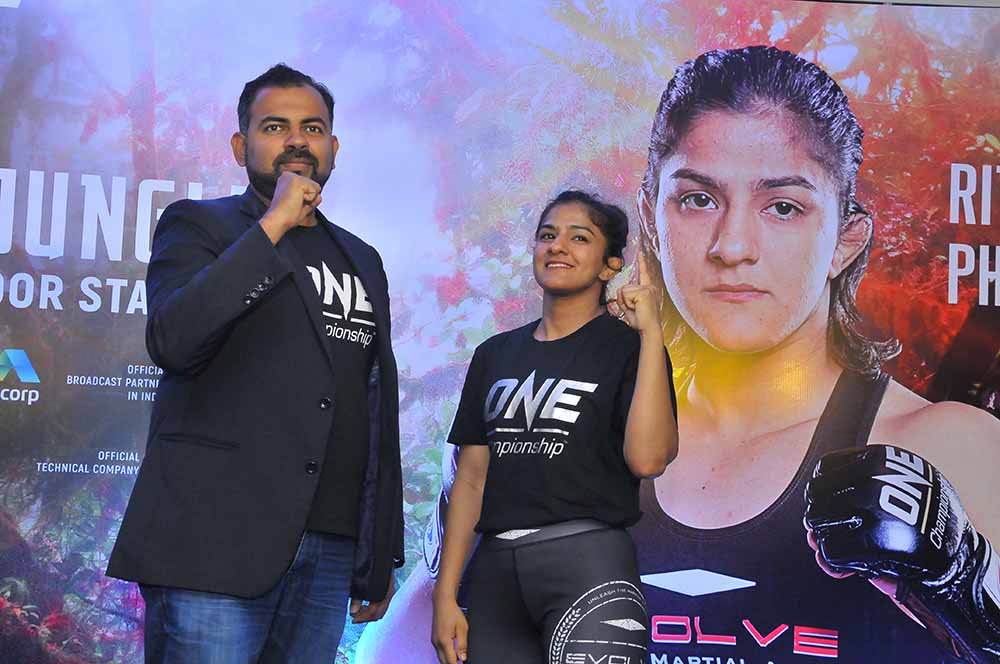 India's Mixed Martial Arts Athlete Ritu Phogat (R) with One Championship Chief Commercial Officer Hari Vijayaranjan during an event in National Sports club of India, Delhi (File Photo) copy
