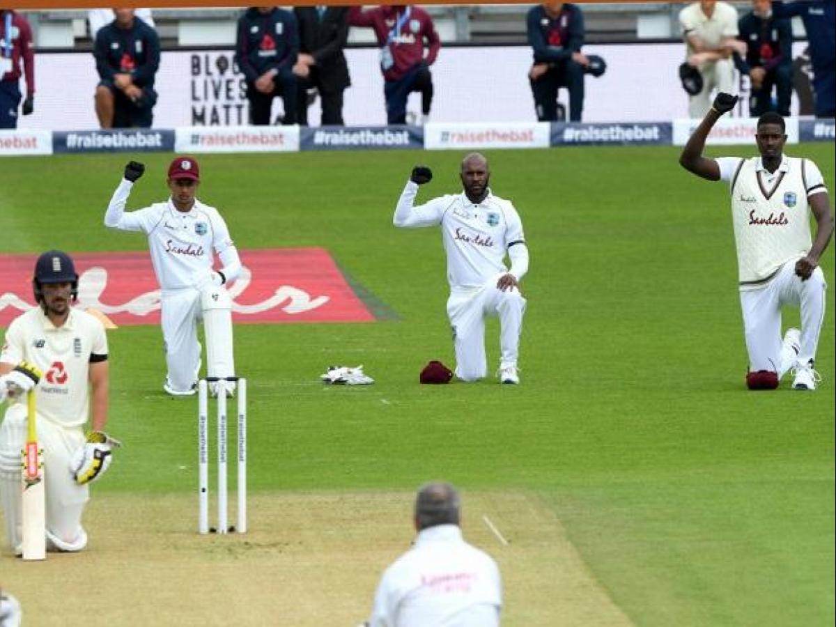 West Indies and England cricketers take a knee